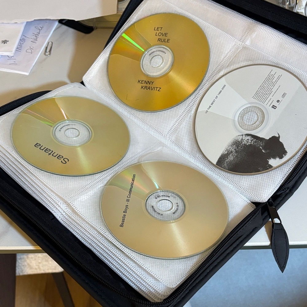 CDs for sale including case